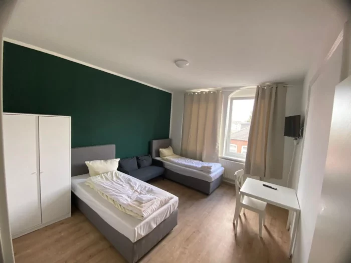 Monteurwohnung mit 2 Bädern im 1.OG Links Schlafzimmer