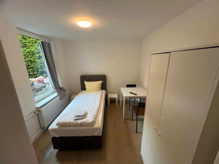 Wohnung in Apartmenthaus in der Innenstadt Schlafzimmer