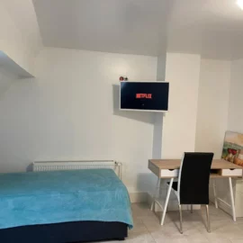 Dachgeschoss 1-Zimmer Apartment Ring Schlafzimmer