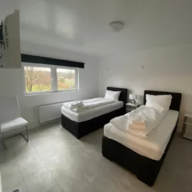 Ring Dachgeschoss 2-Zimmer Apartment Schlafzimmer