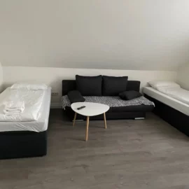 Dachgeschoss Wohnung Wilhelm Schlafzimmer