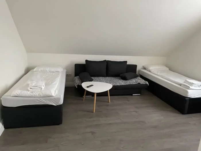 Dachgeschoss Wohnung Wilhelm Schlafzimmer
