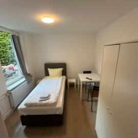 Wohnung in Apartmenthaus in der Innenstadt Schlafzimmer